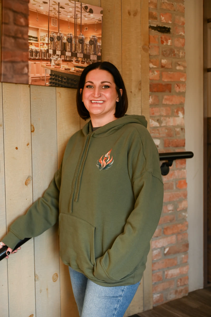 Rena Cross wearing a Phoenix Mental Health hoodie